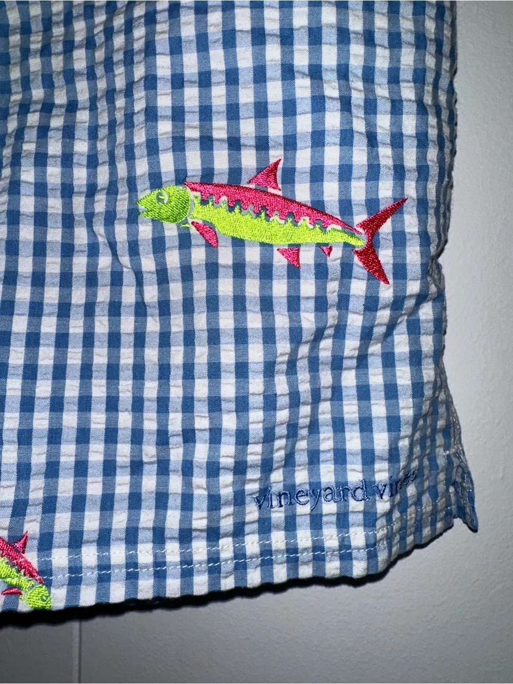 Vineyard Vines blue gingham and neon embroidered fish swim trunks